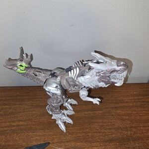 Silver Robotic T-Rex Action Figure with Green Accent
